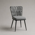 Sedia da pranzo imbottita in tessuto poliestere grigio con schienale intrecciato e gambe in acciaio nero 52 x 58 x 82 cm